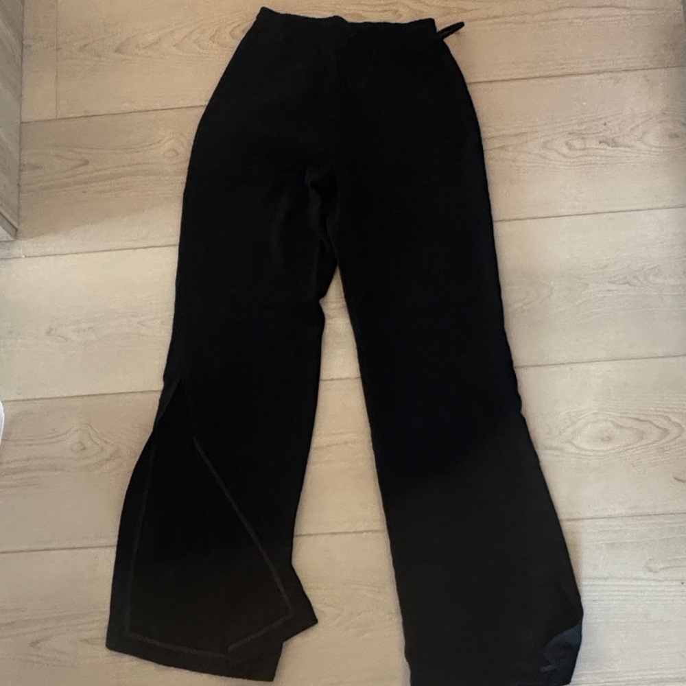 Black drawstring pants with slit
